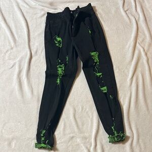 Black Ripped Jeans with Green Accents